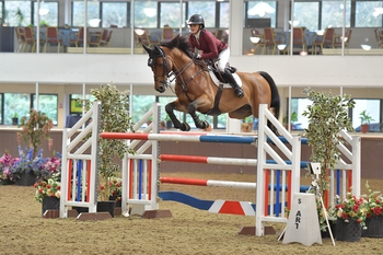 Georgia Tame lands the Winter Grand Prix win at Addington Manor Equestrian Centre